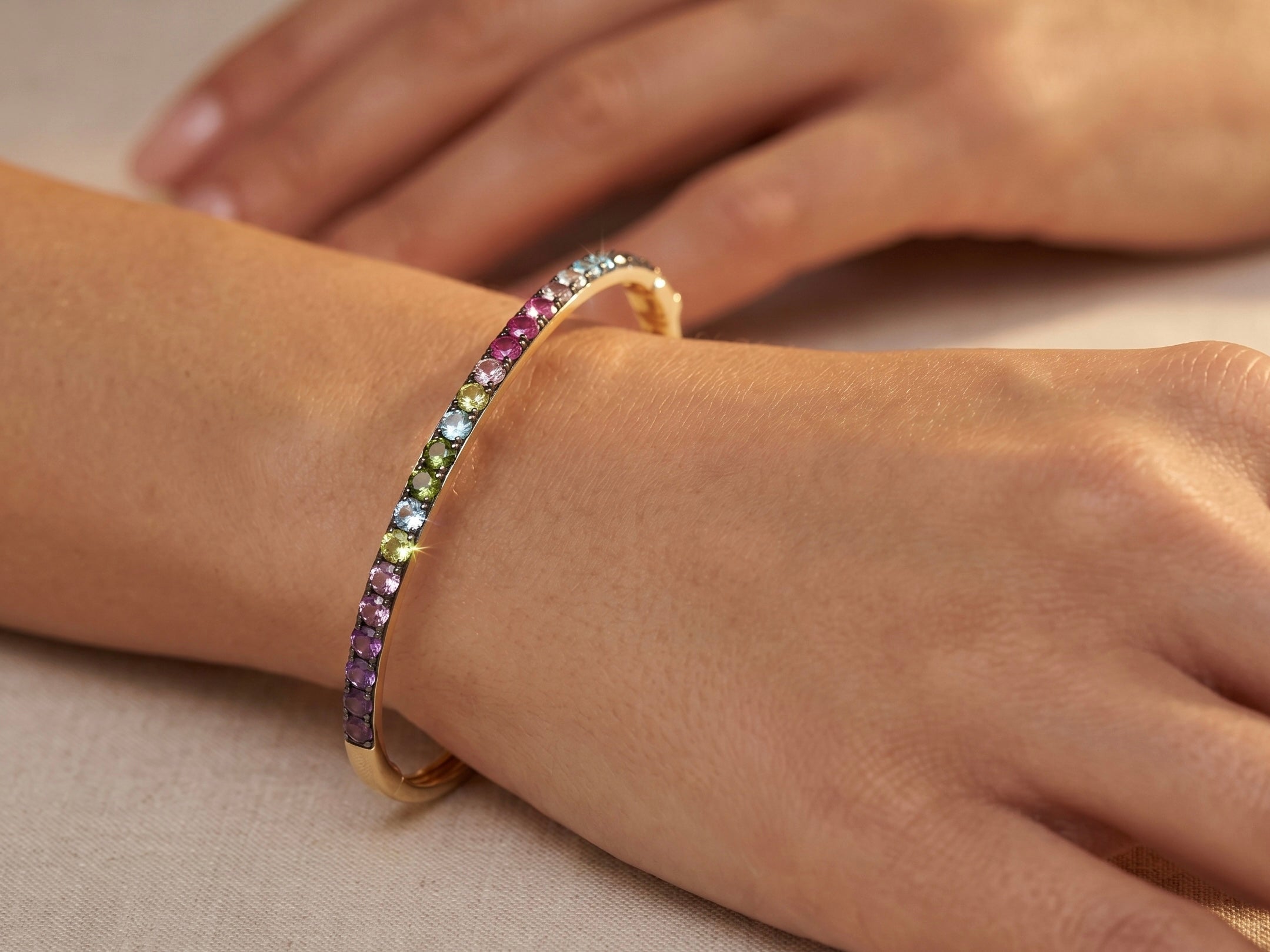 The Eleanora "Spectrum" Multi-Gemstone Ombré Bangle in 14k Yellow Gold